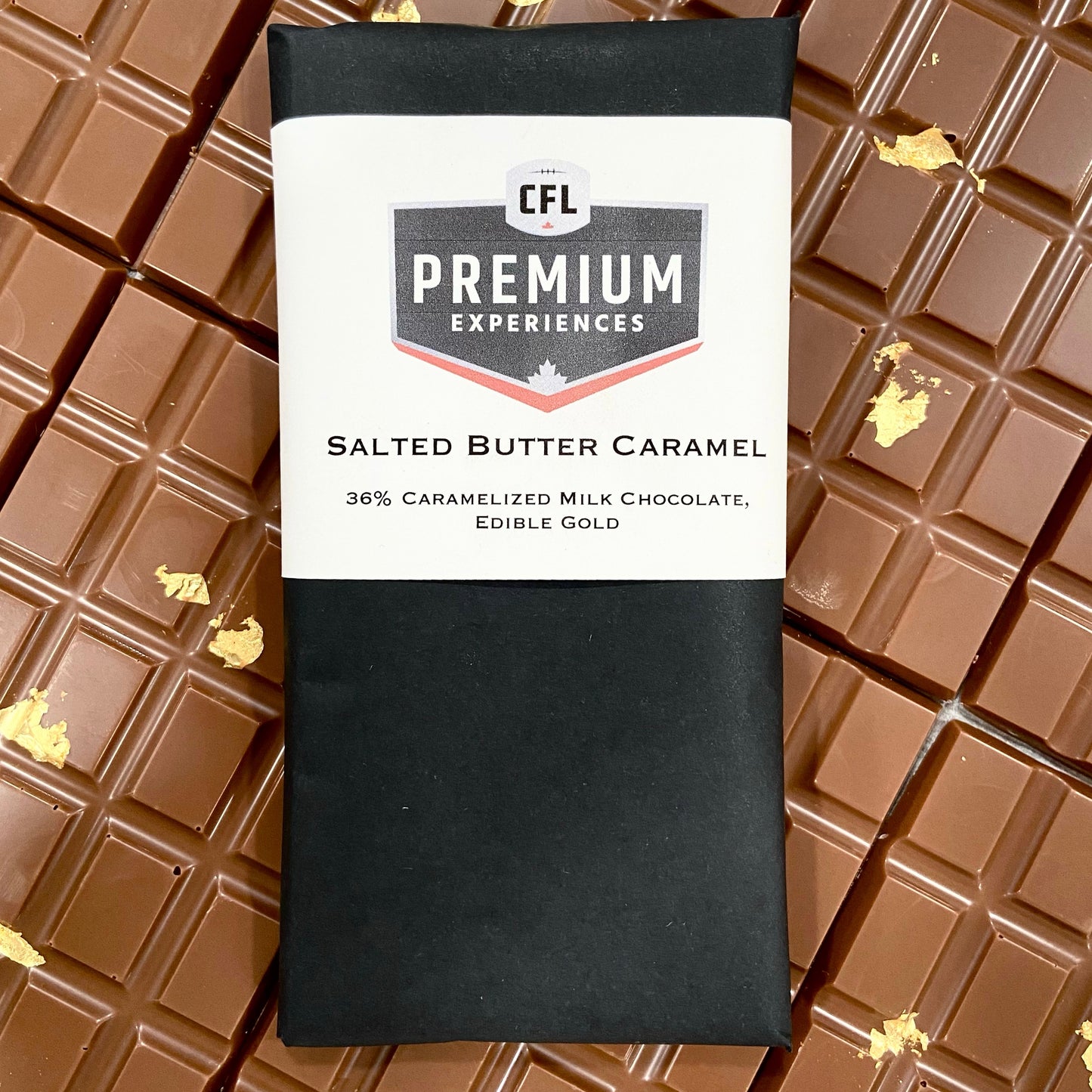 A Salted Butter Caramel Chocolate Bar wrapped with a CFL logo.