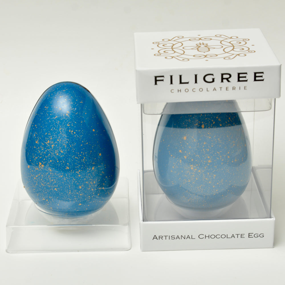 
                  
                    Blue and Gold Painted Egg
                  
                